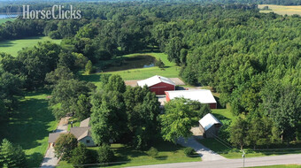 IMPRESSIVE TURN-KEY EQUINE FARM WITH HOME