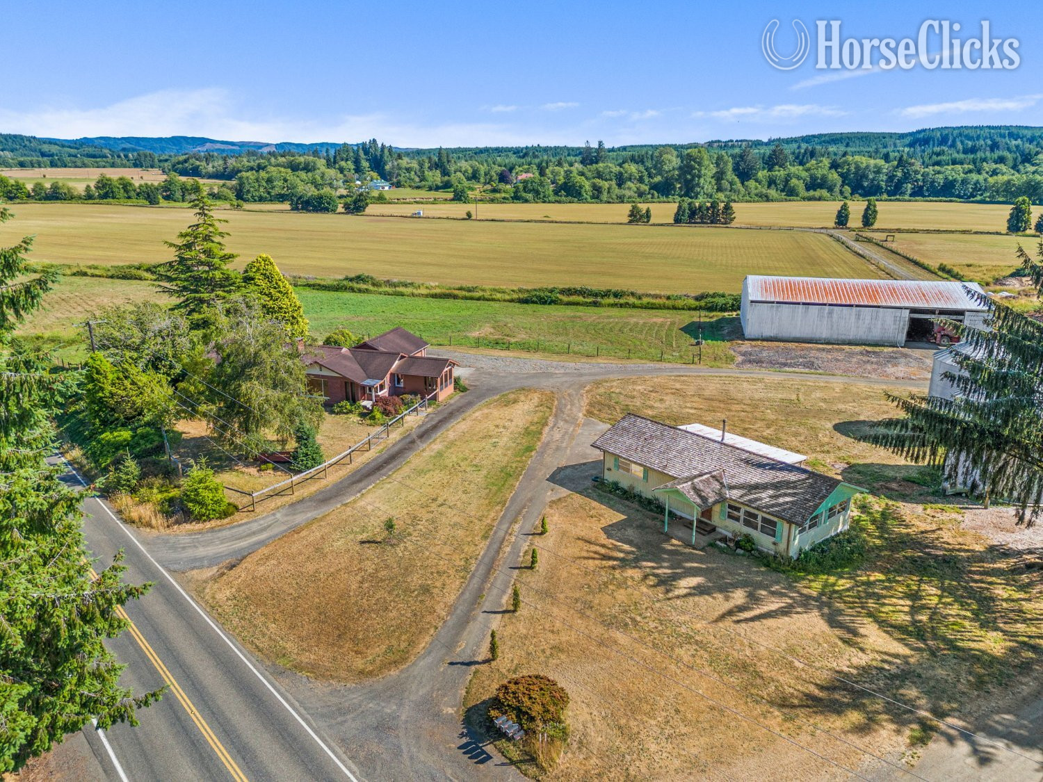 This 93-ac farm has 3 parcels, 2 homes, barns, and outbuildings. in Washington