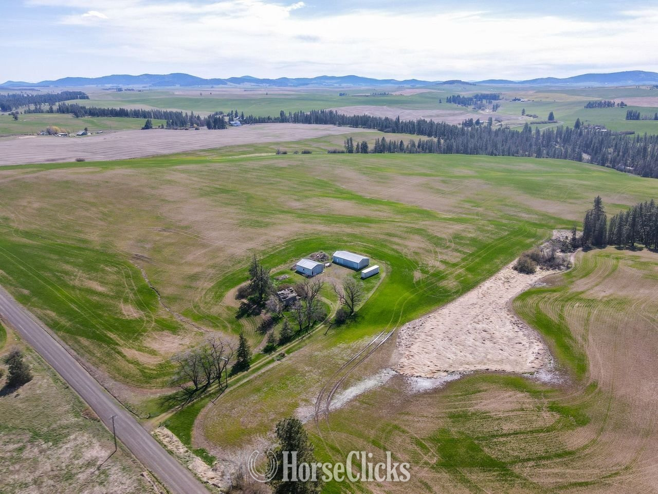 Stunning 157 Acres with Sweeping Territorial Views, Out Buildings, Power and Well! - Land For Sale in Washington