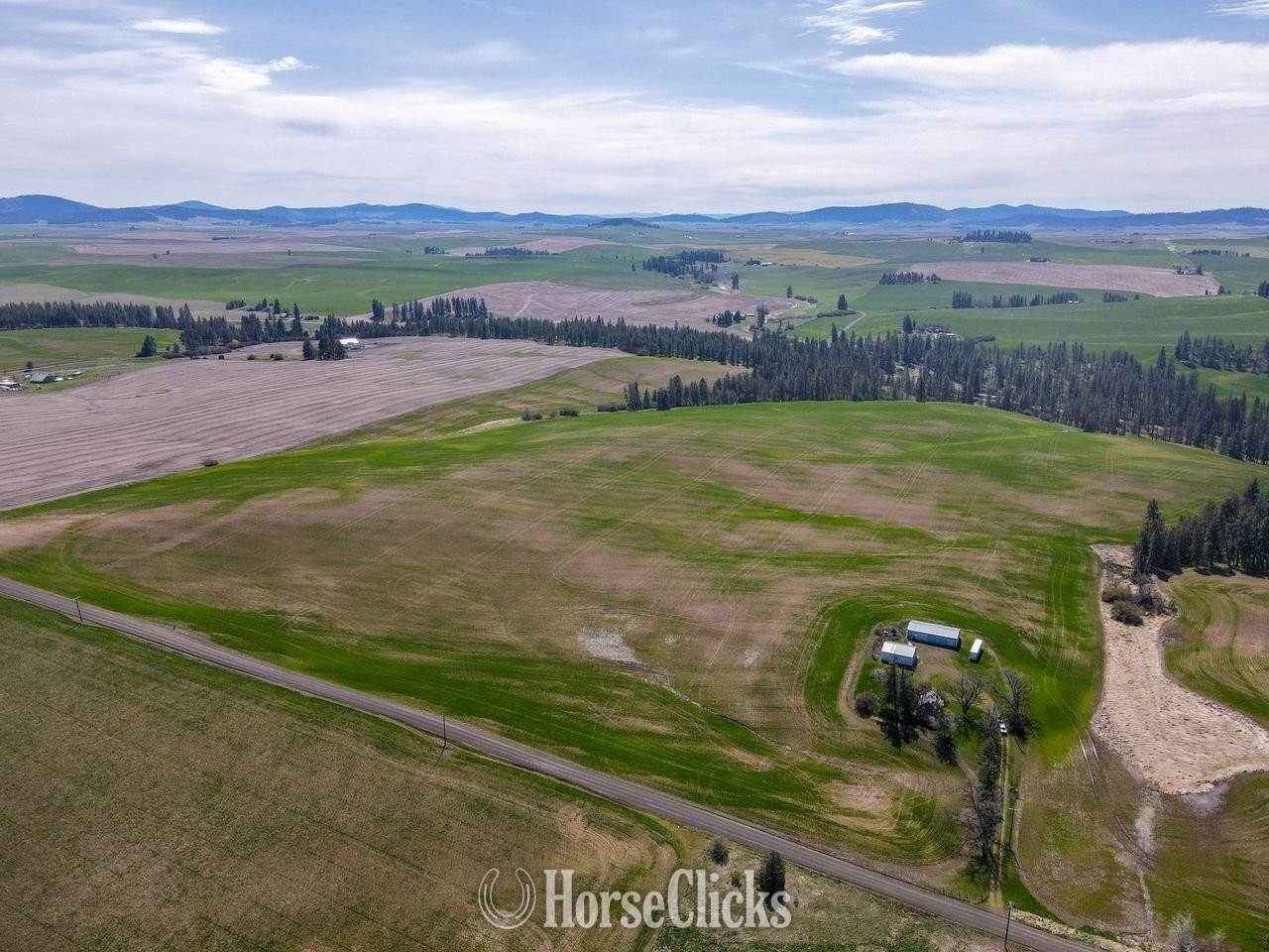 Stunning 157 Acres with Sweeping Territorial Views, Out Buildings, Power and Well! Washington