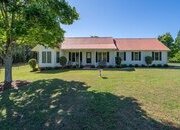 Custom-built estate nestled on 6 acres