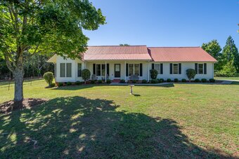 Custom-built estate nestled on 6 acres