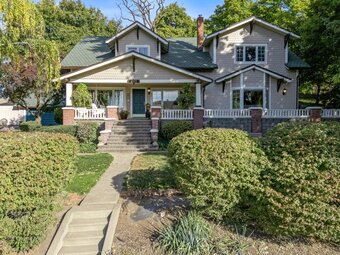 One of Kind Beautiful Craftsman Home, 2 Barns, Shop, Storage and Acreage!