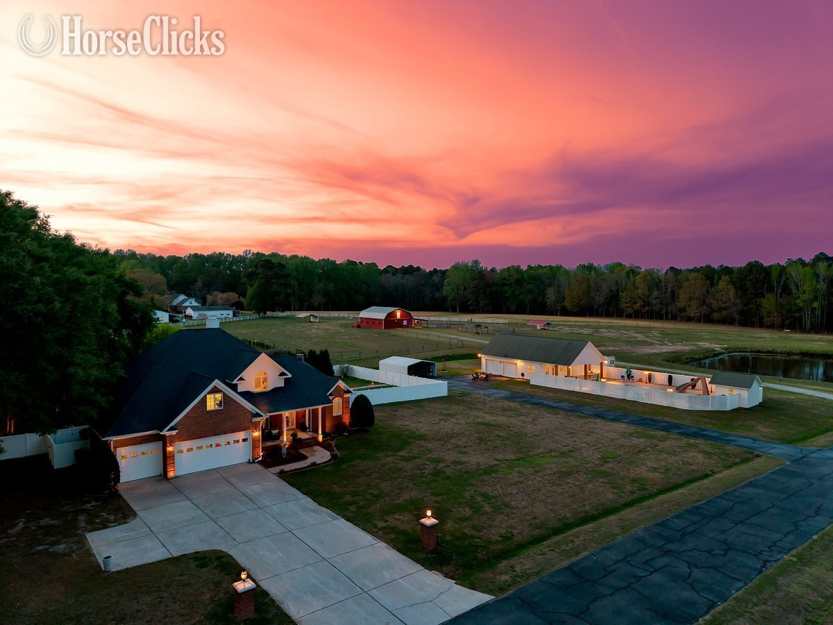 8 Acres, 6 Stall Horse Barn, 3 Pastures, Pool, 2000 sq ft garage/pool house in North Carolina